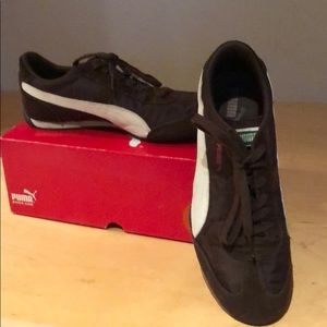Brown Pumas women’s size 9